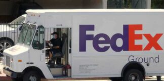 FedEx Ground delivery truck parked on a street