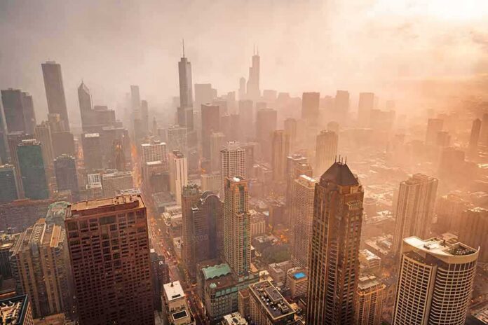 shutterstock_2529870303 City skyline in warm haze at sunset