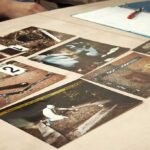 Crime scene photos laid out on a desk