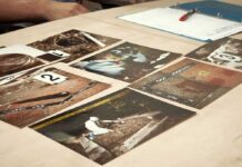 Crime scene photos laid out on a desk