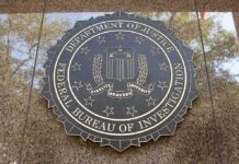 Taxpayer Outrage: Paid To Quit? FBI emblem on a building wall