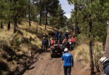 72-Year-Old Found After Week In Wild rescue team with ATVs on a forest trail
