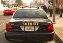 Sheriff patrol car parked on city street