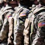 Pentagon Doubles Combat Pay – What’s Brewing? Soldiers in camouflage uniforms standing in formation